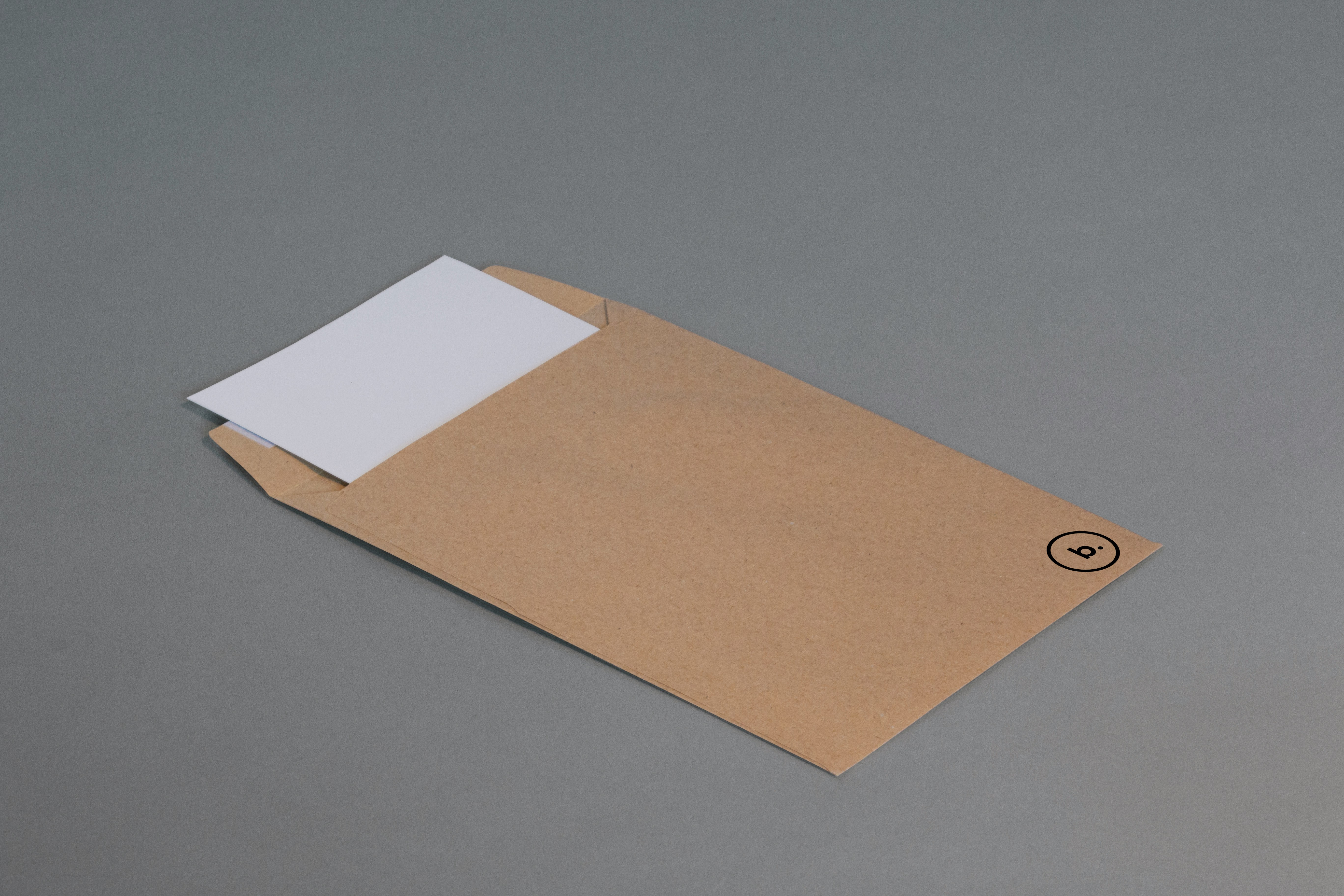 Minimal paper envelope on neutral background.